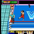 Classic wrestling game screenshot with fighters in ring and referee.
