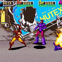 Arcade game screen with pixel art characters and explosion effects.