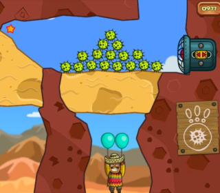 Alt: Fun puzzle game featuring a mole and explosive balls in a rocky canyon setting.