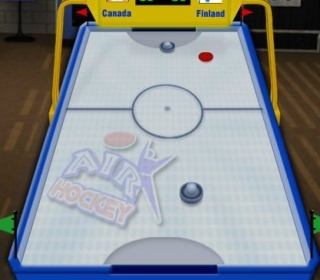 Air Hockey game with Canadian and Finnish flags in the background.
