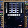 Classic arcade game screenshot with brick-breaking action.