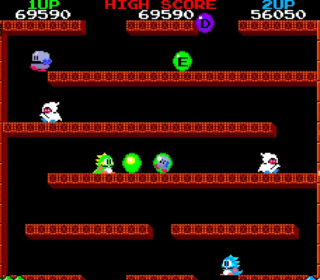 1. Classic Pac-Man arcade game with colorful ghosts and pellets.