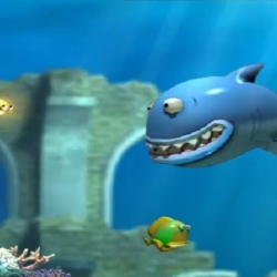Colorful underwater game scene with cartoon fish characters and a large shark illustration.