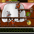 Colorful Pac-Man-inspired arcade game with lively character animations on platforms.