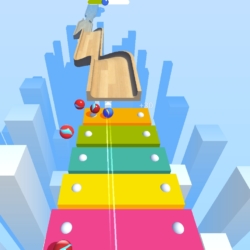 Color Race game scene with rolling balls on a vibrant rainbow path, navigating through a colorful 3D environment.