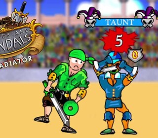 Epic battle in Swords and Sandals Gladiator game, featuring a clown and soldier combat.